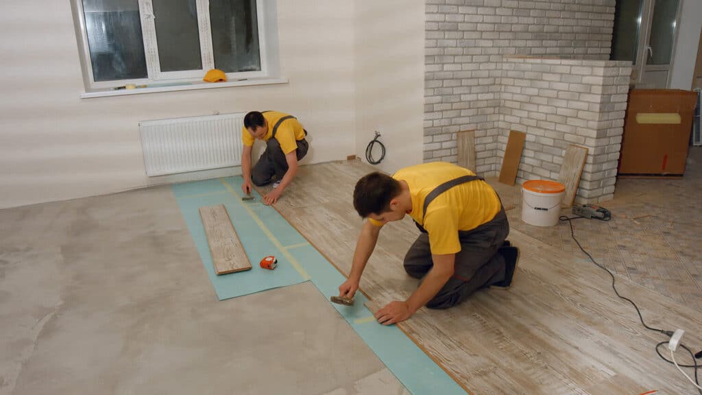 builders-installing-laminate-floor-2023-11-27-05-01-28-utc.jpg